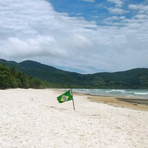Brazilian flag on beach, symbol for Brazilian Portuguese language